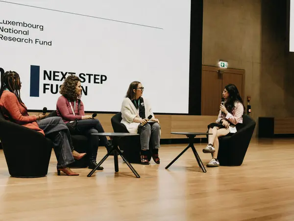 A panel discussion on stage at YWC 2026