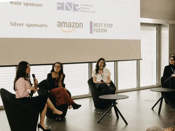 Panellists sharing their career stories on stage